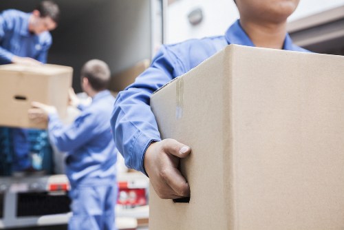 Professional flat removals in Primrosehill with moving boxes and apartment access