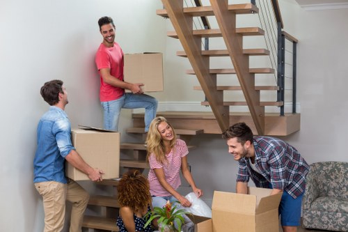Same day removals team loading furniture in Primrosehill