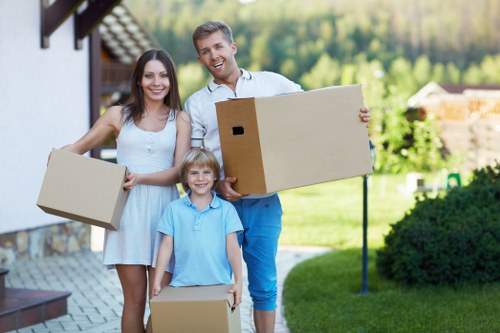 Moving team packing household items for a Primrosehill relocation