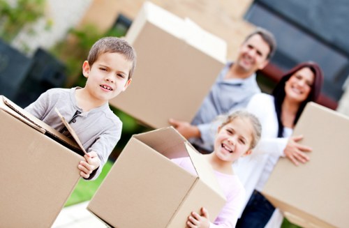 Boxes and furniture being loaded for a student relocation in North West London