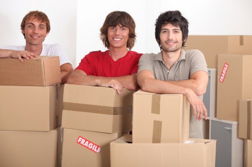 Team handling furniture carefully during a move
