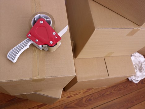 Protective packing materials and cartons ready for office relocation in Primrosehill